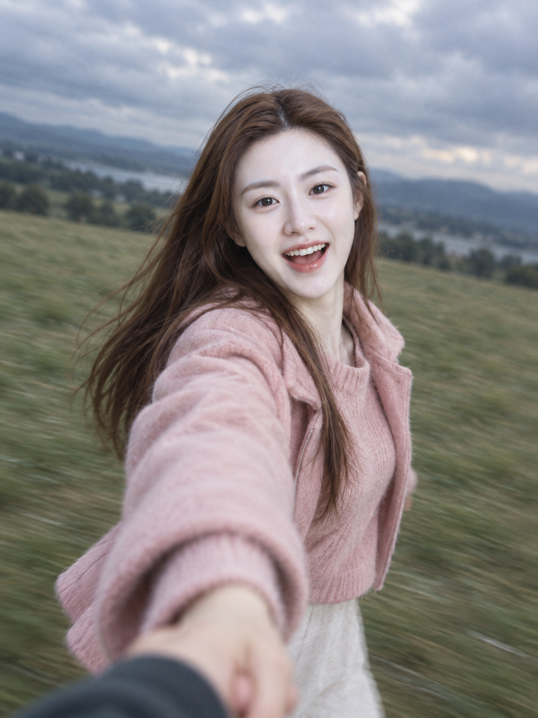 Free-Spirited Portrait of a Couple Spinning Hand in Hand on Cloudy Grassland