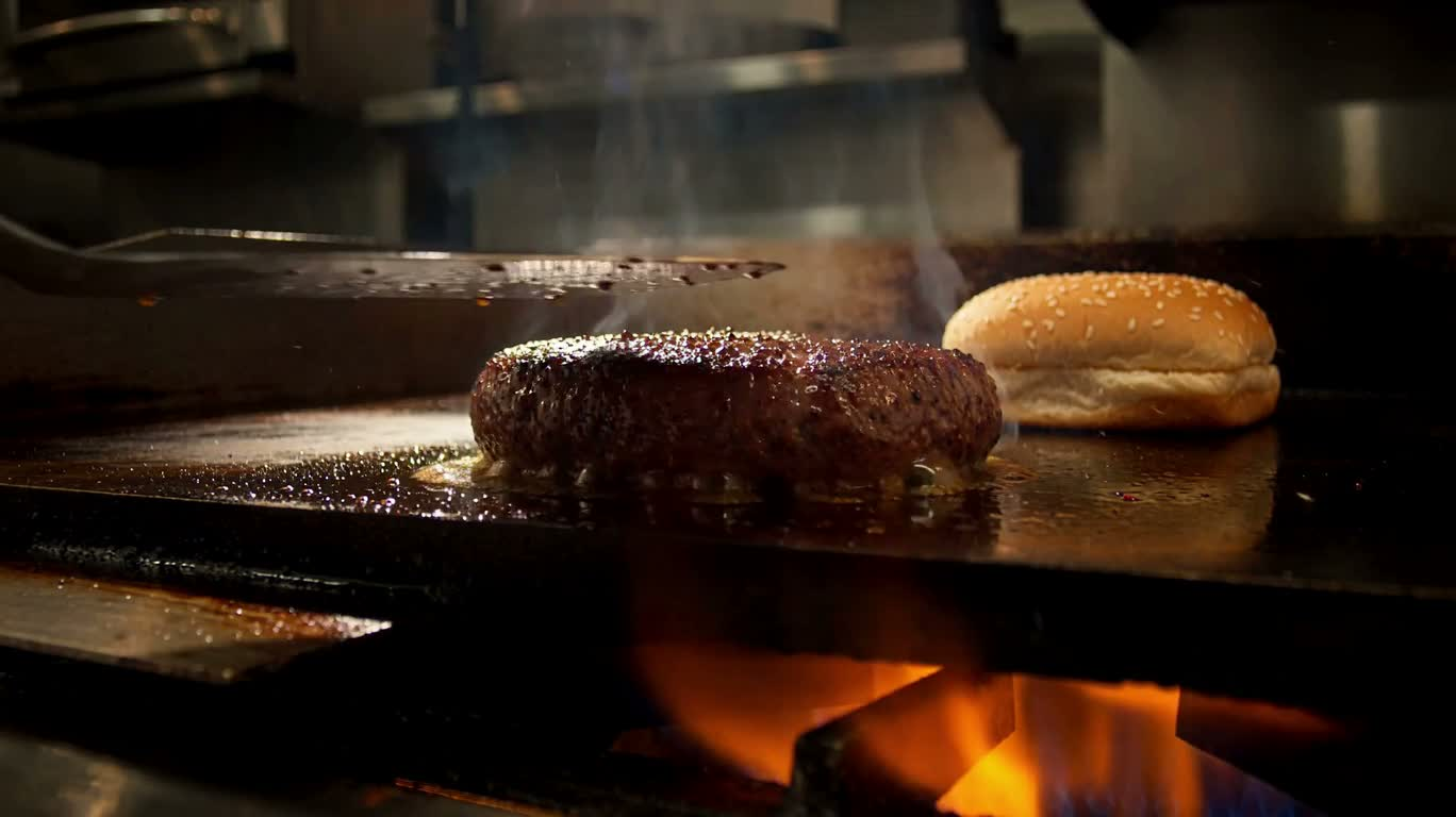 Late-Night Kitchen Burger Sizzling Close-Up