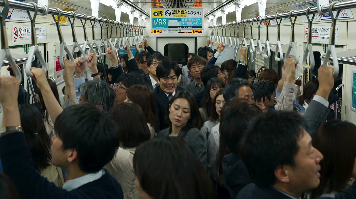 満員電車のミニチュア通勤者
