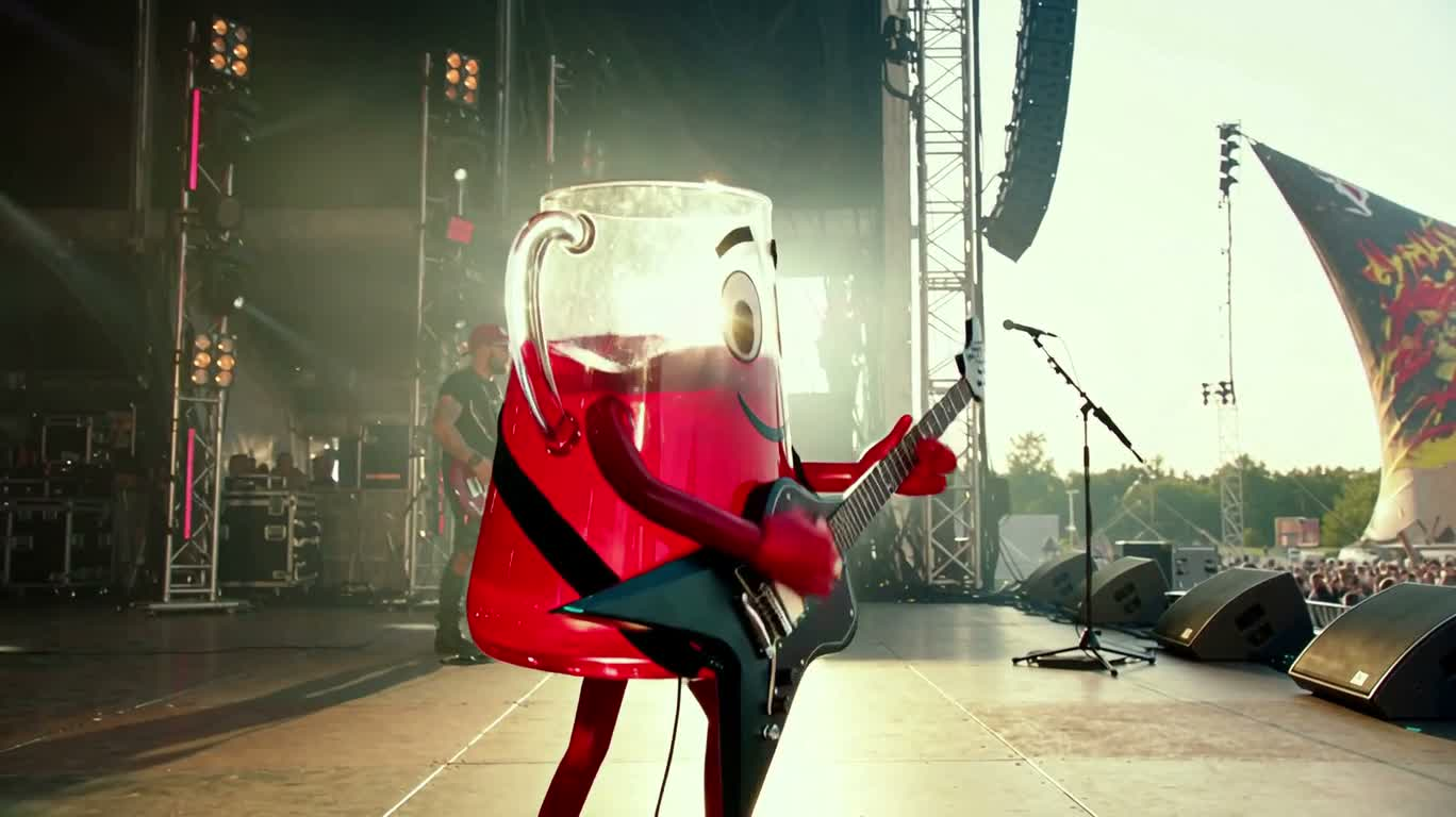 Spectacle rock du mascotte rouge de trois ans