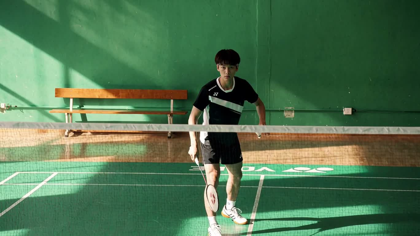 Badminton Soaring Over a Sunlit Court
