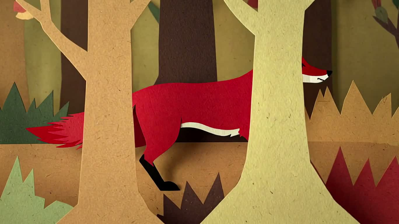 Renard roux dans une forêt de papier