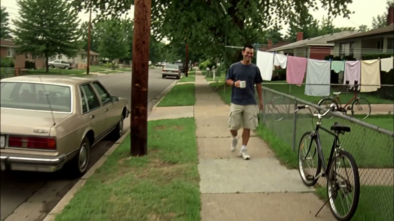 Coffee and Bicycle in a Summer Neighborhood
