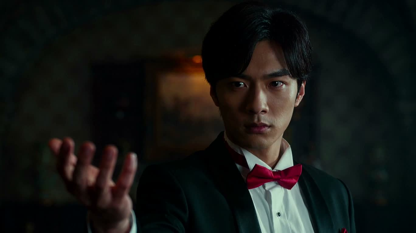 The Flame Magician Gazing at the Audience