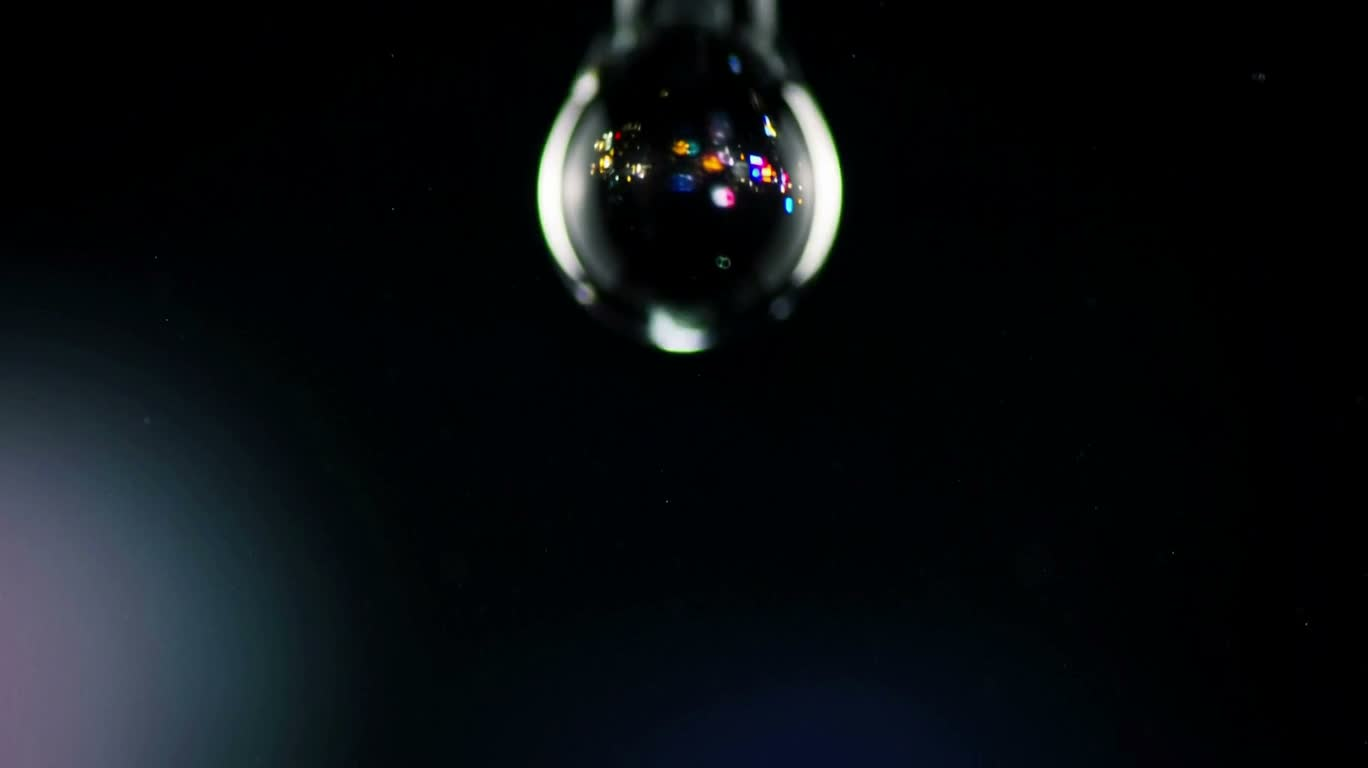 ネオン都市の水滴星門 — AI video creation
