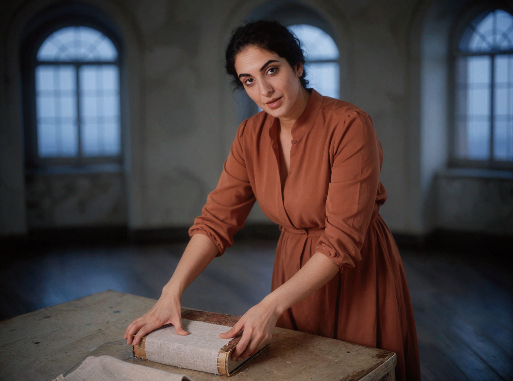 Adult Middle Eastern Woman Book Restorer · Spine Repair · Vintage Lens Swirl Bokeh — AI image creation