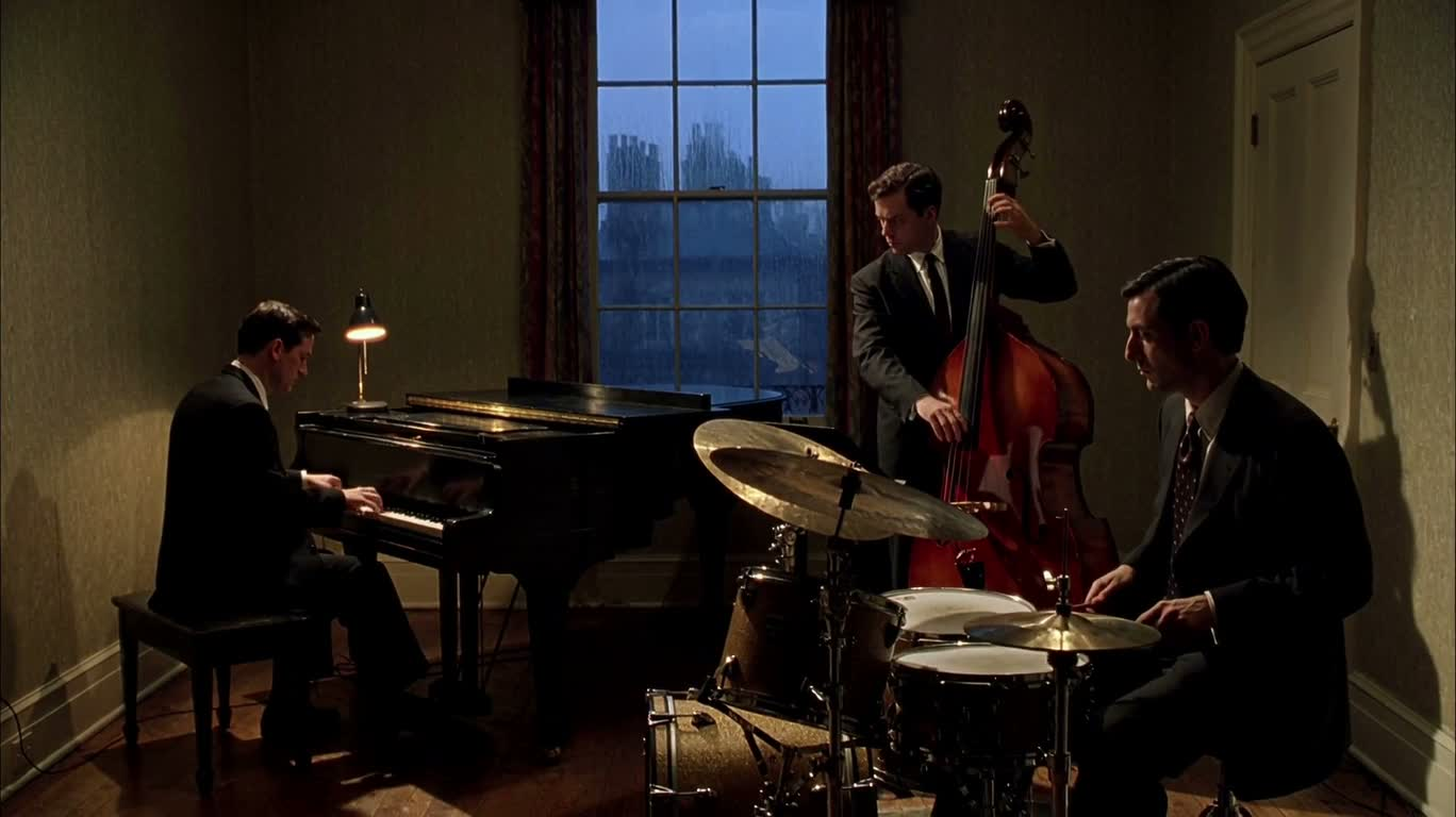 Trio de jazz à la fenêtre sous la pluie
